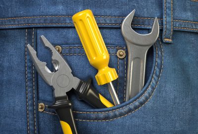 Tools in jeans pocket. Service and engineering concept. 3d illustration